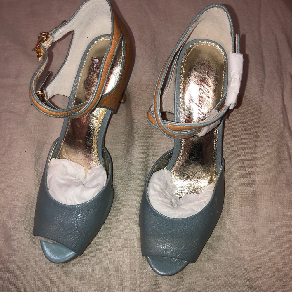 Ms Albright blue and tan heels.  Never worn.